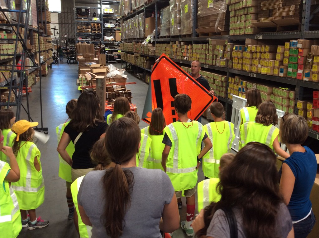 Tim Landosky showing the PCCH Students a 'Lane Closed Ahead' reflective sign