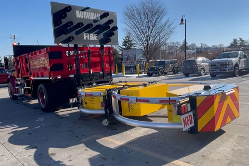 The Norwalk Fire Department's new blocker truck with the Scorpion attenuator in the deployed position. The driver can raise or lower the attenuator while sitting in the cab without needing to leave the safety of the vehicle.