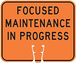 "Focused Maintenance In Progress" text in Black on Orange sign (#017)