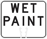 "Wet Paint" text in Black on White sign (#055)