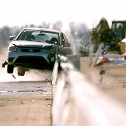 The HV2 Barrier being impacted by a car during testing.