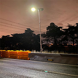 The HV2 Barrier with SLED End Treatment under a streetlight.