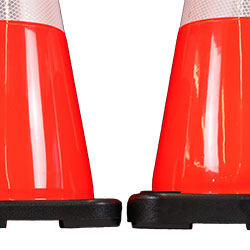 Side by side comparison of the 7 lb. [left] and 10 lb. [right] TrafFix PVC cones showing the difference in height of the rugged base.