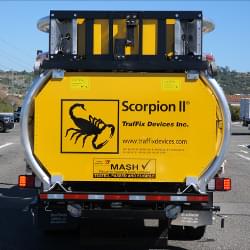 The Scorpion II Truck Mounted Attenuator (TMA), Model C, traveling on the road.