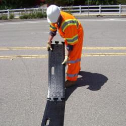 Three (3) TrafFix Alert Rumble Strips cover a standard width lane.